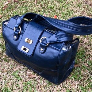 Marc Jacobs blue leather bag with gold hardware.